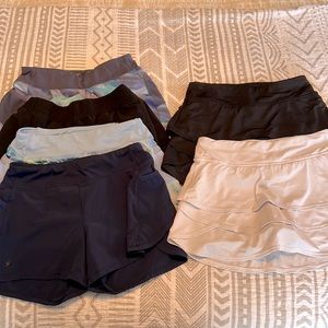 BUNDLE!! Athleta Girl Size Medium (8-10) two tennis skirts and four run shorts